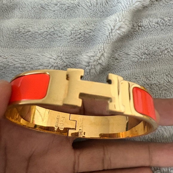 Hermès Gold and Orange Clic H Bracelet - Picture 1 of 3